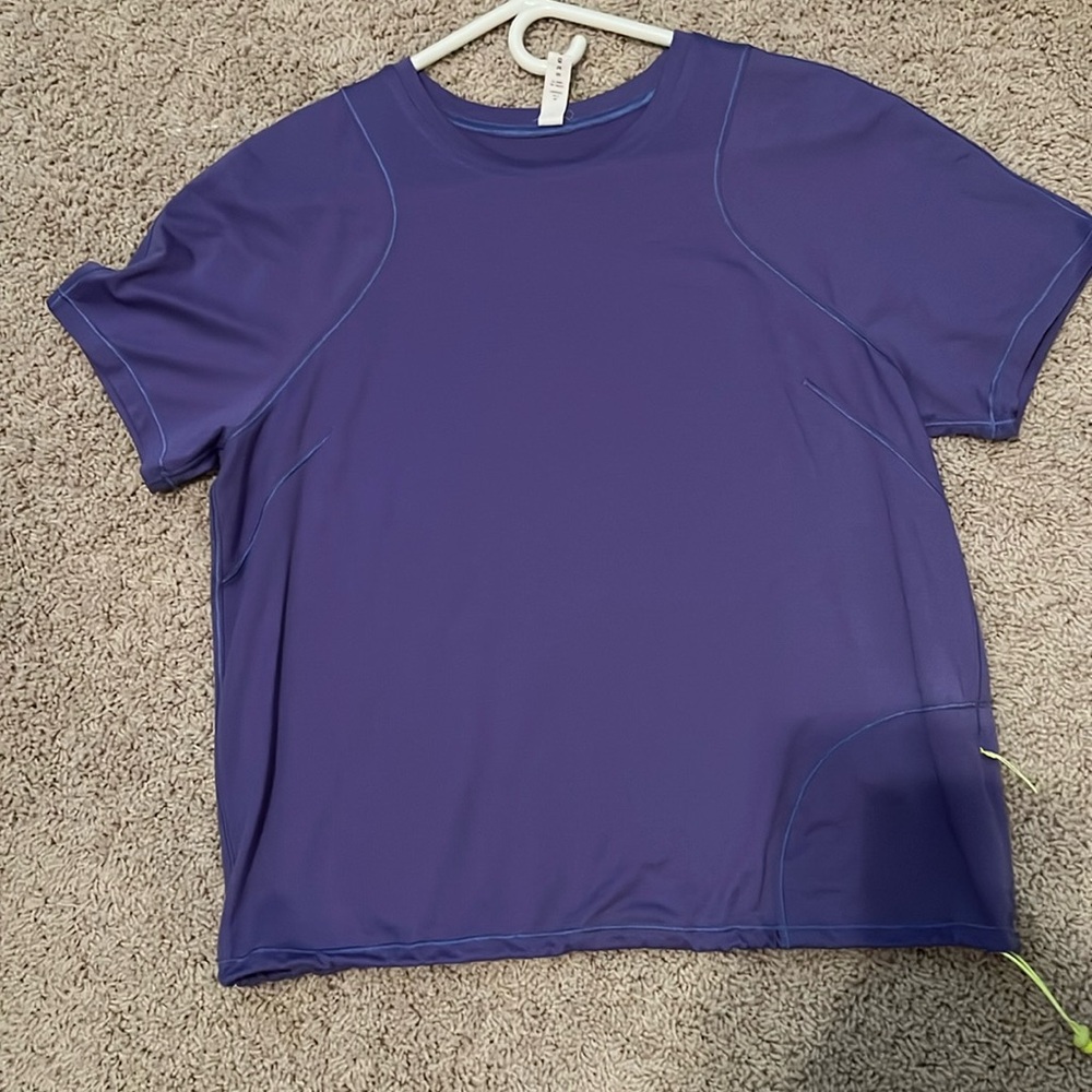 Lululemon cinched hem lightweight hiking shirt 
Zipper pocket 
Size 10
Like new